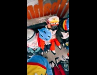 Kids riding cable car to go snowboarding 