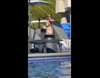 Woman in bikini with drinks poolside photoshoot Part 2