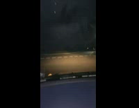 Man Falls Off Car Roof as it Stops