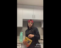 Brown pitbull weiner dog mix girl kitchen 