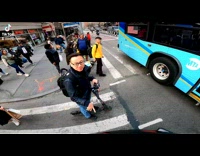 Collab WINY - Man in Scooter Commends Man on Longboard