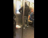 Guy dances by himself in subway train