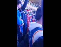 Sport fan dances in Christmas pajamas 