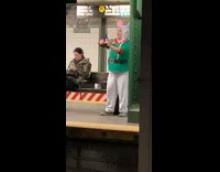 Subway rabbit man records himself singing in subway station
