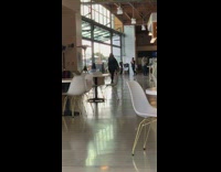 Woman dance inside cafe dress face mask