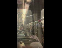 Collab Subway Creatures - Man dances like crazy in the middle of aisle across train car window