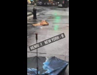 Pizza and umbrella on floor after hurricane