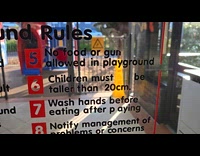 Man reads some Hungry Jacks playground rules