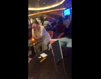 Guy tumbling entrance for cruise trivia game