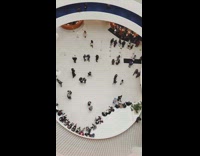 Birds eye view of people walking around 