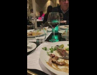 Girl black sleeves dance tiktok inside restaurant