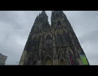 People wears VR in front of the church 