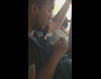 Collab Subway Creatures - Man holds hermit crab in his hand backpack in front on subway train