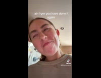 Woman react amazed with air fryer food