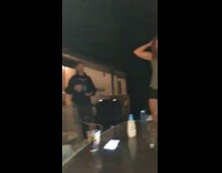Lady dances one foot on table backyard