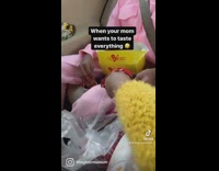 Mom checks on her kids food 