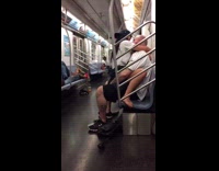 NSFW couple in baseball jerseys on subway getting it on doing it