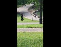 Girl grey pants jump rope workout park