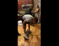 Guy rides skateboard in kitchen falls 