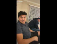 Guy camera in shirt pocket set up 