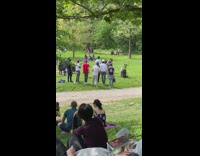 Group of men dance park music video shoot