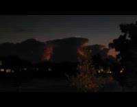 Cumulonimbus storm clouds with lightning night sky