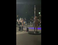 Blue bodysuit black heels girl pole park 