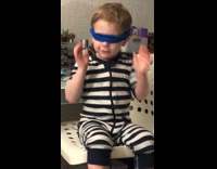 Boy cover eyes says he cannot see