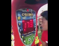 kid in red punches arcade game