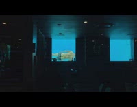 Guy swims in aquarium tank with his butt showing, whale