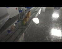 Dry ice on the marble table vibrates and fell off