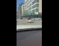 Guy drives JetSki on street guy drives JetSki on street