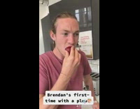 Red shirt guy eats plum first time