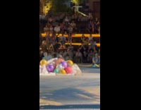 Woman balloons performance live act at park