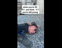 Man Jumps off and Lays Face Down on Ground