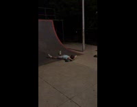 Man skateboards on quarter pipe but fell