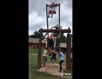 Riding a little wooden ferris wheel in Thailand