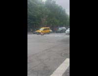 Guy sits in middle of crosswalk 
