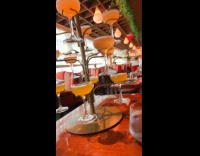 Couple at restaurant ordered Bellini cocktail tree