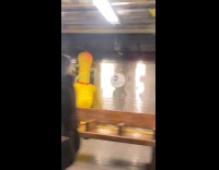 Person wears inflatable costume runs to train