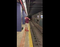 Two men play violin and cello from across subway station and battle each other