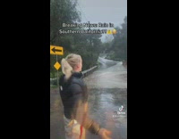 Girl pretends to be news reporter rain