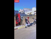 woman struggles to put on corner sheet