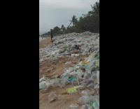 Plastic and trash washed up on beach 