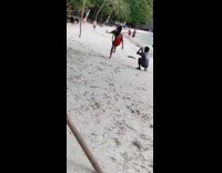 Red dress girl black circle swing beach 