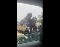 Collab winy - Man ride motorcycle with dog on backpack