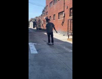 Man sings for video shoot at alley