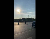 Collab IITW - Lady Stands on Middle of Street while Vehicles Pass by