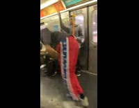 Guy breakdancing in middle of subway train