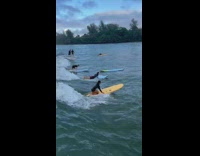 Mark Zuckerberg surfs on water 